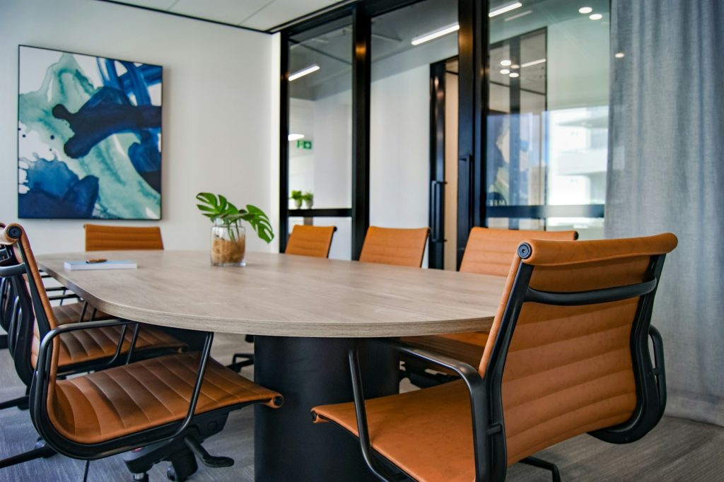 A board meeting around a conference table